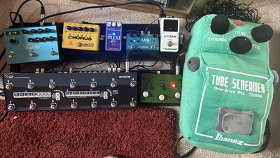 Ibanez Tube Screamer Stuffed toy with a pedalboard