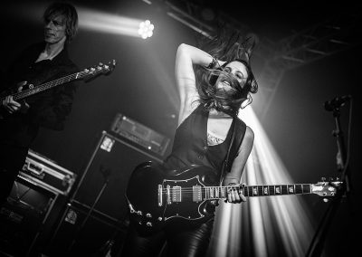 Spanish guitar player Susana Raya jumping on the Progpower Europe stage